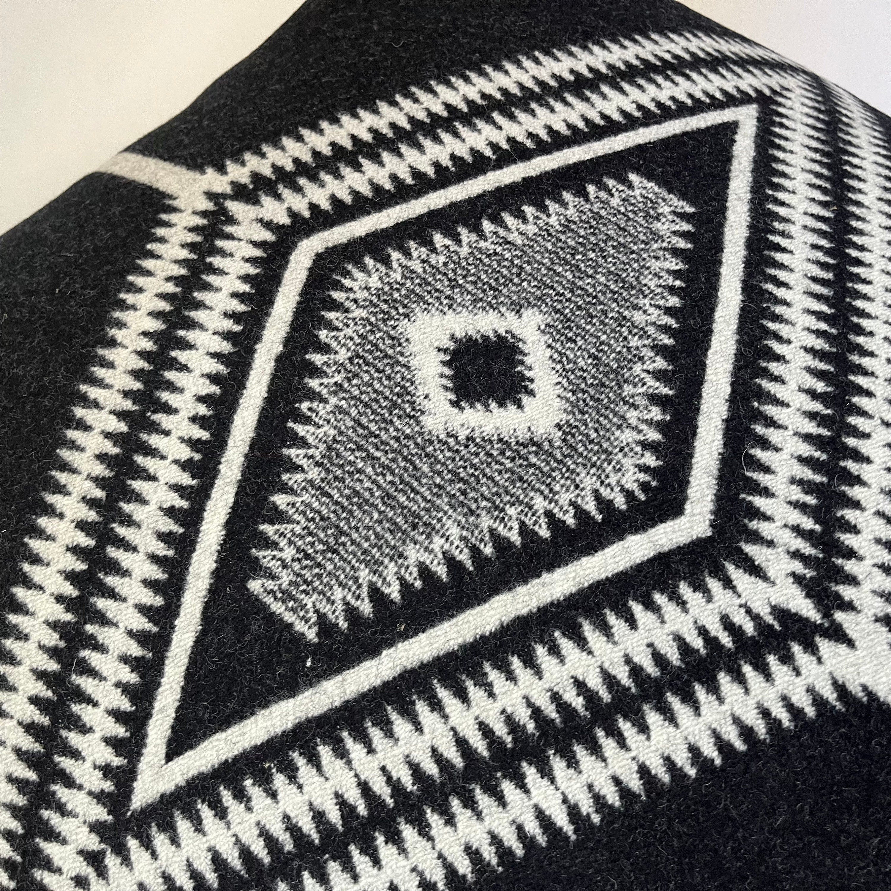 Los Ojos Wool Pillow Cover: Black Cream Throw Pillow (24x24)