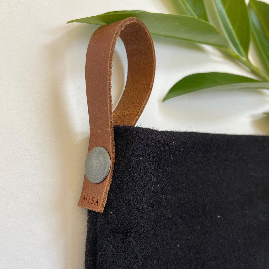 Christmas stocking black wool stocking leather hanging tabs handmade large and mini version available